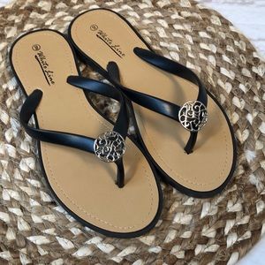 white line flip flops